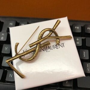 Yves Saint Laurent Gold Brooch